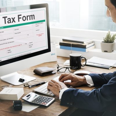 Professional crypto tax consultant in Manchester assisting with penalty reduction
